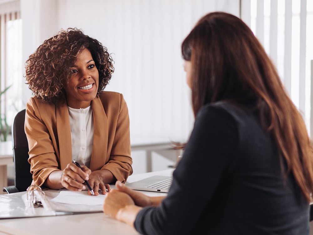 Woman consulting with a female financial manager